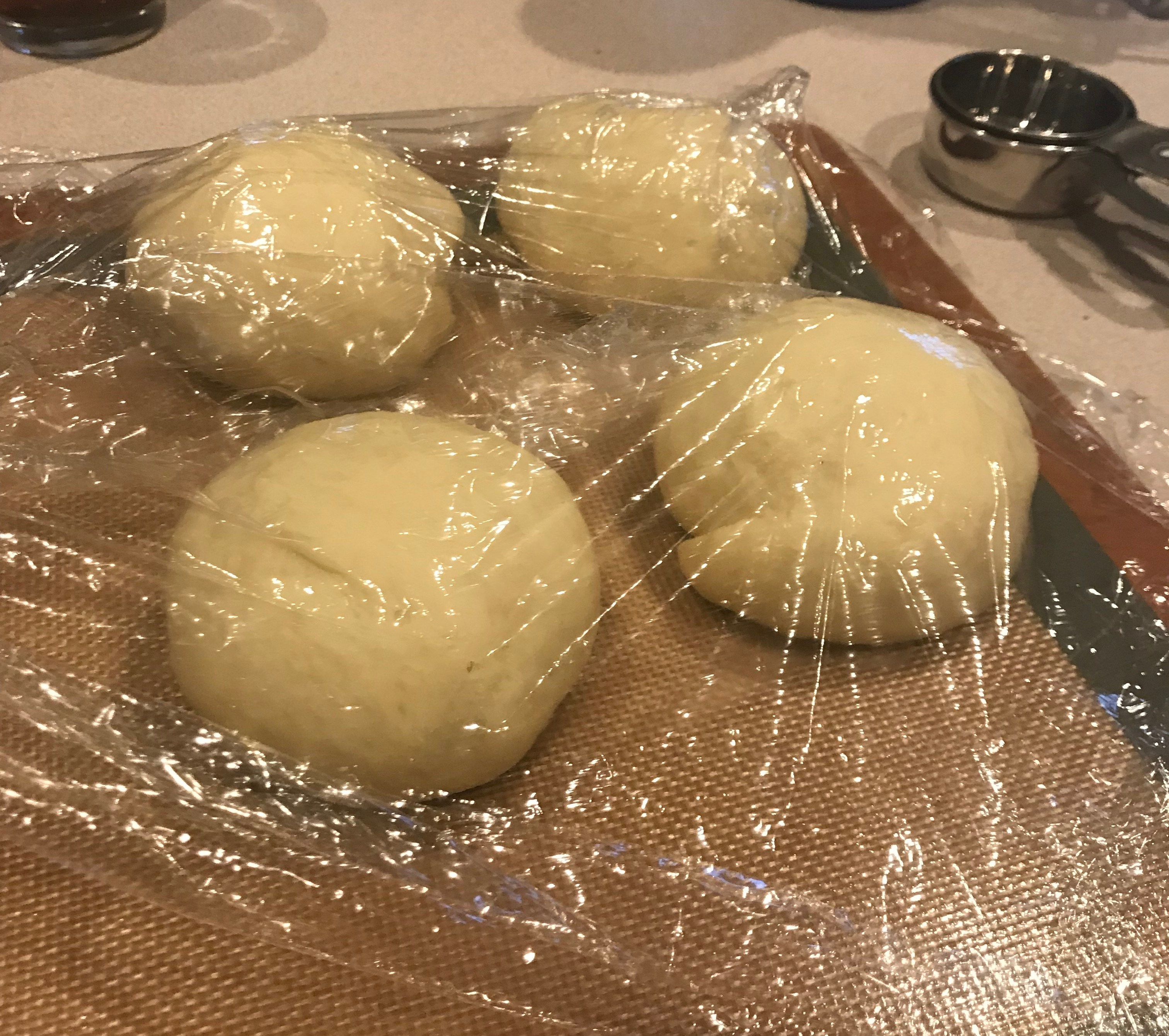 risen dough rounds